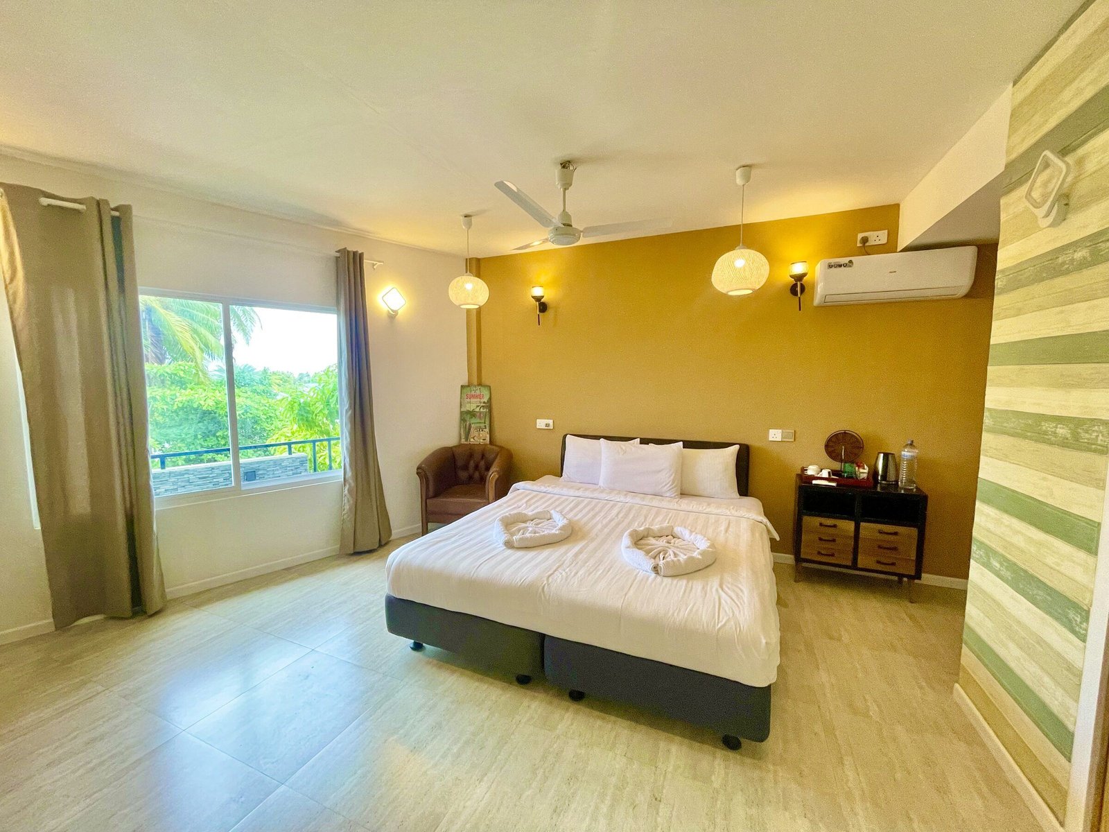 Jacuzzi Room bedroom with a double bed and island view at Koimala Maamigili