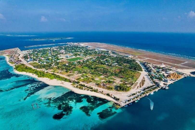 Maamigili island and its surrounding reef in South Ari Atoll