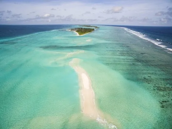 White sandbank in open ocean near Maamigili, South Ari Atoll